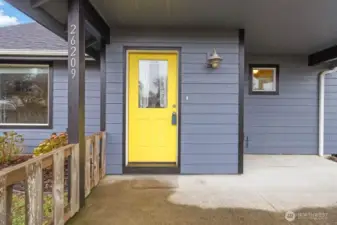 Cheery yellow door to brighten up the grayest of days!