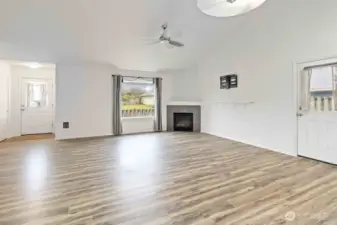 Cozy propane fireplace + Luxury vinyl plank flooring