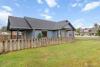 Fenced Front yard, east side of house.