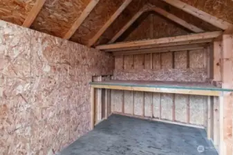 Nice work bench inside the shed.