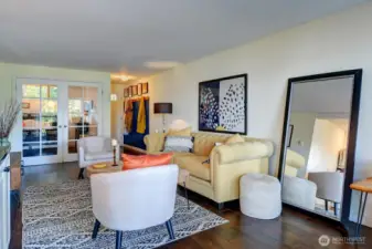 French doors lead to the spacious bedroom.