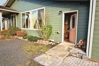 Second entry with ramp, into home, takes you into mud/laundry room.