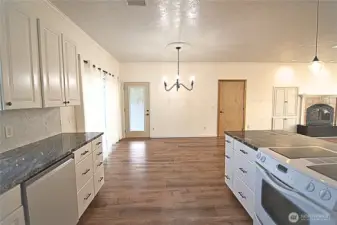 kitchen is wide open with easy movement and stove has front controls, nice big island!