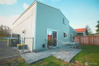 Patio slider and paver patio on the Living quarter/ADU side. Fully fenced for privacy