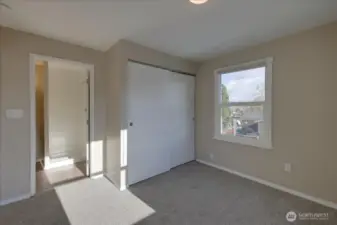 Unit #1 Bedroom looking at bath on left and don't miss the territorial views from most all units!