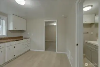 Unit #4  New carpets and water proof laminate flooring. Also had all electrical switches and outlets replaced. Both doors new!