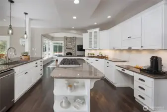 Updated chef's kitchen features dual islands, Viking 6-burner gas stove & a Sub-Zero fridge.