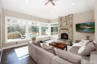 Floor-to-ceiling windows in the kitchen & family room.