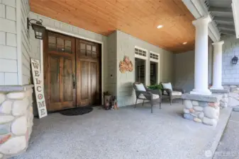 Warm and inviting covered front porch.