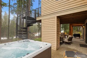 Look at this outdoor oasis! The Beachcraft Myrtle Beach hot tub has a foot massage dome, bluetooth speakers & wi-fi enabled. The spiral staircase leads to the main level covered deck.
