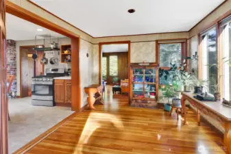Front door entry looking into the kitchen and living room beyond.