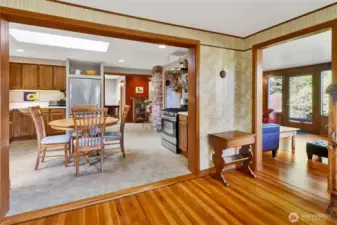 Entry view into the kitchen with an open floor plan that flows easily through the home.