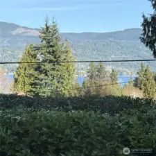 Partial Lake Whatcom and surrounding mountain views. Close to the lake for boating and swimming in the summer months.