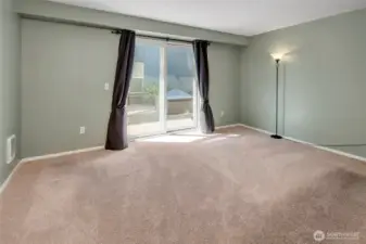 Primary bedroom with slider to the patio