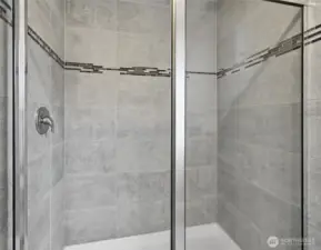 Beautifully tiled large walk in shower