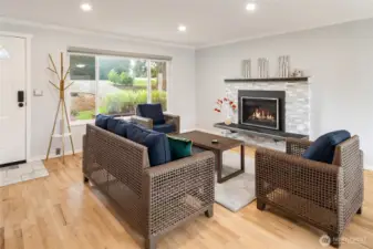 Large front window with remote operated designer blinds.