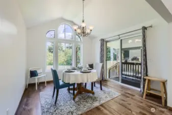East facing  bay windows fill dining room with natural light.