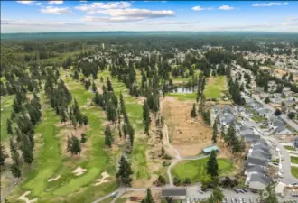 Arial views of the Classics Enclave community overlooking the golf course 8.20.24.