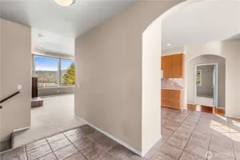 Entry Way to the View! Laundry on the left connected to garage, Kitchen to right