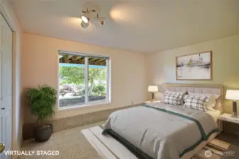 Downstairs bedroom. Virtually staged.