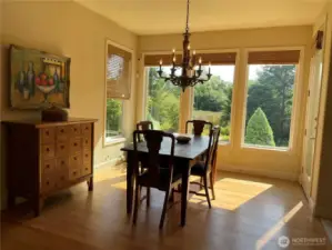 Nook area with hardwood floor, access to the deck.