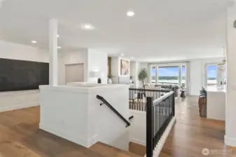 Main Floor with stairs leading to garage level; ELEVATOR/LIFT in background