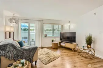 Savvy chic Rare one br  PLUS Den.  This home boasts of lvp flooring  and looks out to patio with new windows and sliding doors