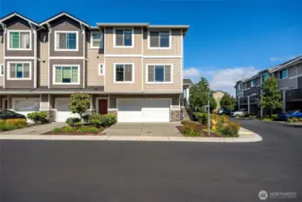 Contemporary architecture with clean lines, fresh paint tones, and a welcoming front entry create an inviting first impression.