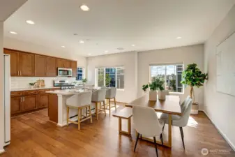 The open floorplan immediately draws you in with abundant natural light, airy ceilings, and seamless flow between living, dining, and kitchen spaces—perfect for today’s lifestyle.