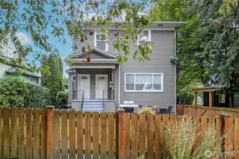Fenced common area courtyard with community BBQ, perfect for outdoor dining and gathering with friends. Bring out the croquet set!