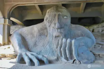 The Fremont Troll sits under the Aurora Bridge, one block from the condo.