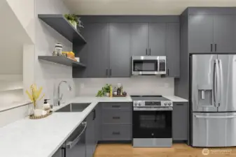 Smart storage, custom cabinetry, and a streamlined layout make cooking and entertaining a breeze.