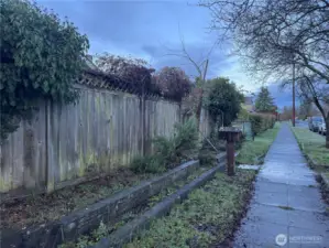 Sidewalks in front of house, lots of street parking.