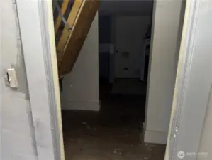 View from room. Picture of stairs that leads to attic/additional bedroom.