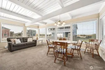 wide open space for a large dining table or keep the secondary seating area.