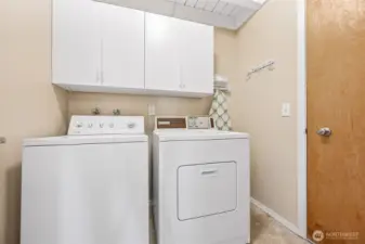 Utility room with exit door.