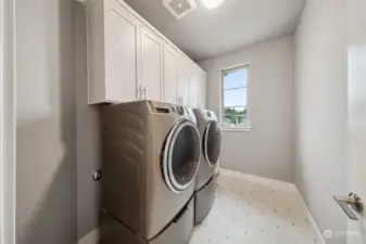 Laundry with cabinets