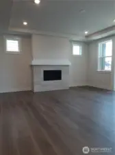 Gas fireplace with beautiful tilework warms the great room.