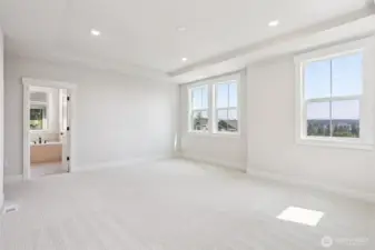 View from primary bedroom into ensuite bath. Photo is of similar home-details & finishes will vary-ask site agent for details