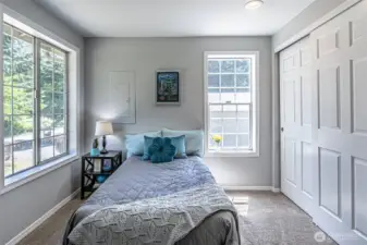 Second bedroom comes with closet organizers.