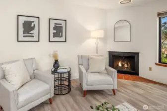 Cozy wood-burning fireplace.