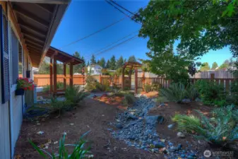 Professionally landscaped front and back yard.