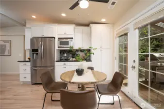 French doors lead you out onto a large, covered deck.