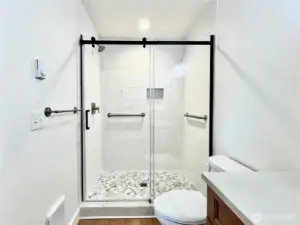 Elegant Walk-in Tiled Shower with modern glass door