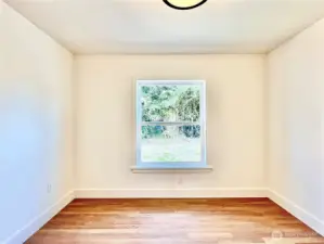 View of Window looking at the back lawn of Bedroom #2
