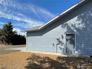 "Man Door" to the Garage leading to the south side of the home