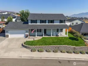 Large front porch and attached garage