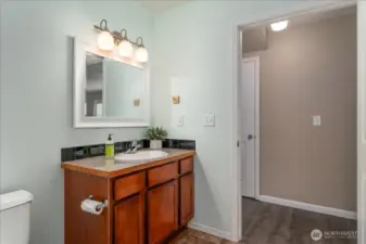 Powder room with extra door to laundry room