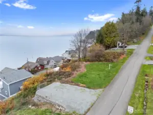 Live steps from beach access with year-round vistas of Baker, Whidbey, and the sea.