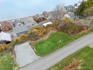 Upper lot off Brown Rd. Drain field in grassy area for neighbor